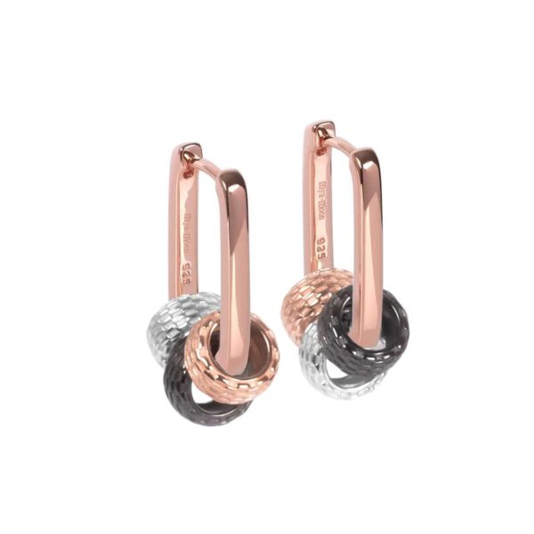 Minimalist sterling silver hoops with polished rhodium finish on white background